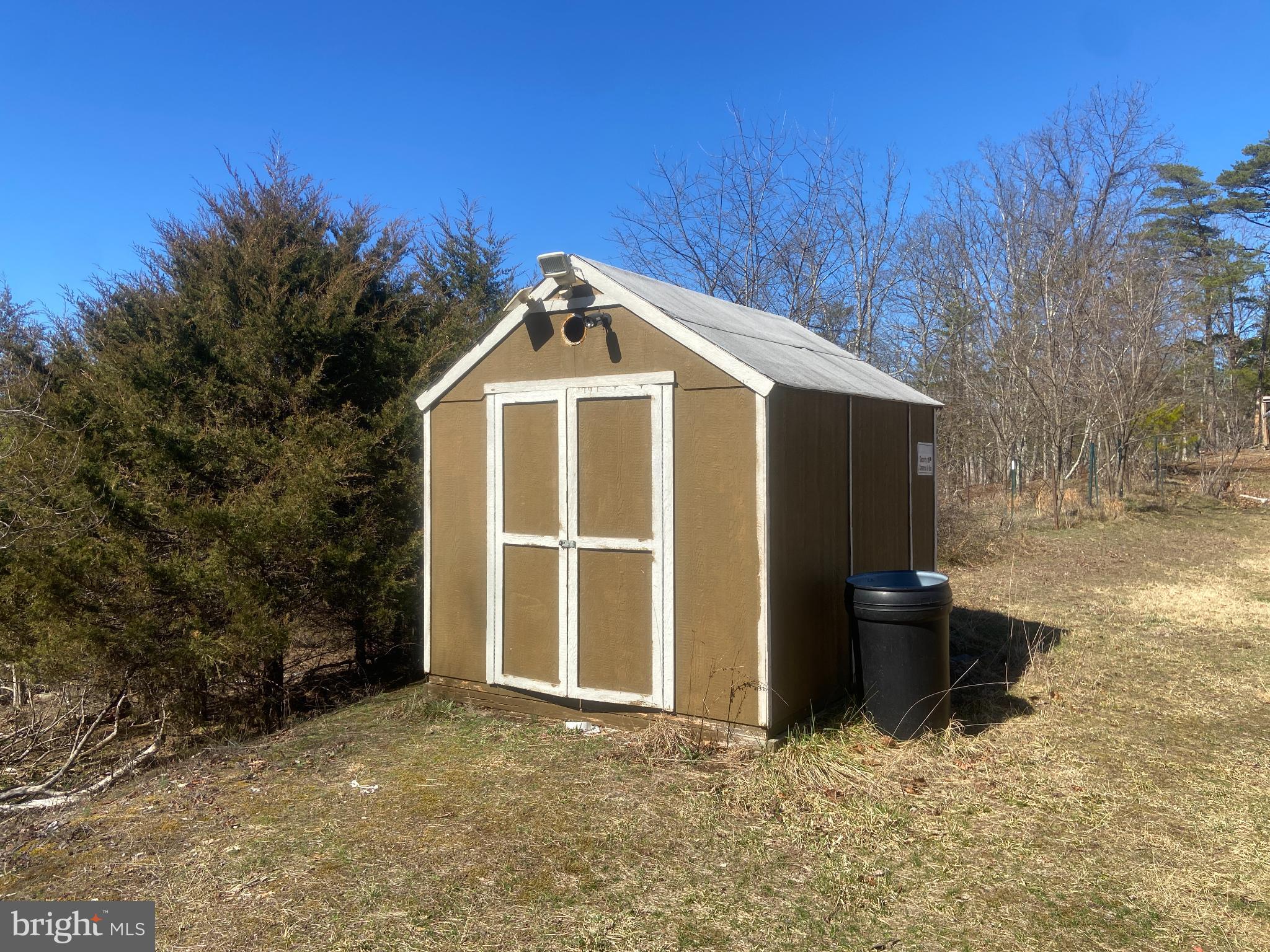 31207 Gold Plains Road Southeast Little Orleans, MD 21766 - Photo 44 of 96 a front view of a house with a yard