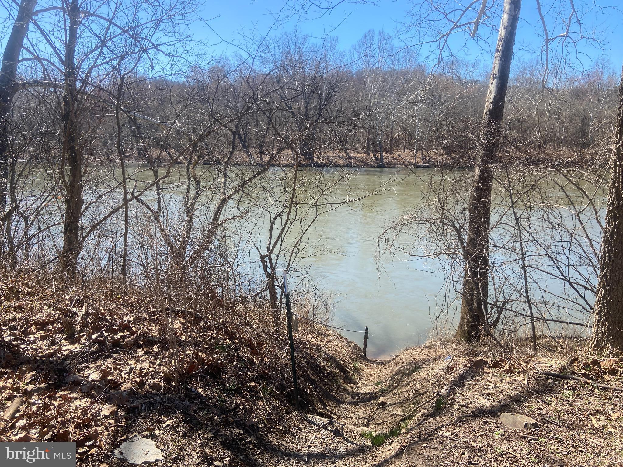31207 Gold Plains Road Southeast Little Orleans, MD 21766 - Photo 86 of 96 a backyard of a house with lots of green space