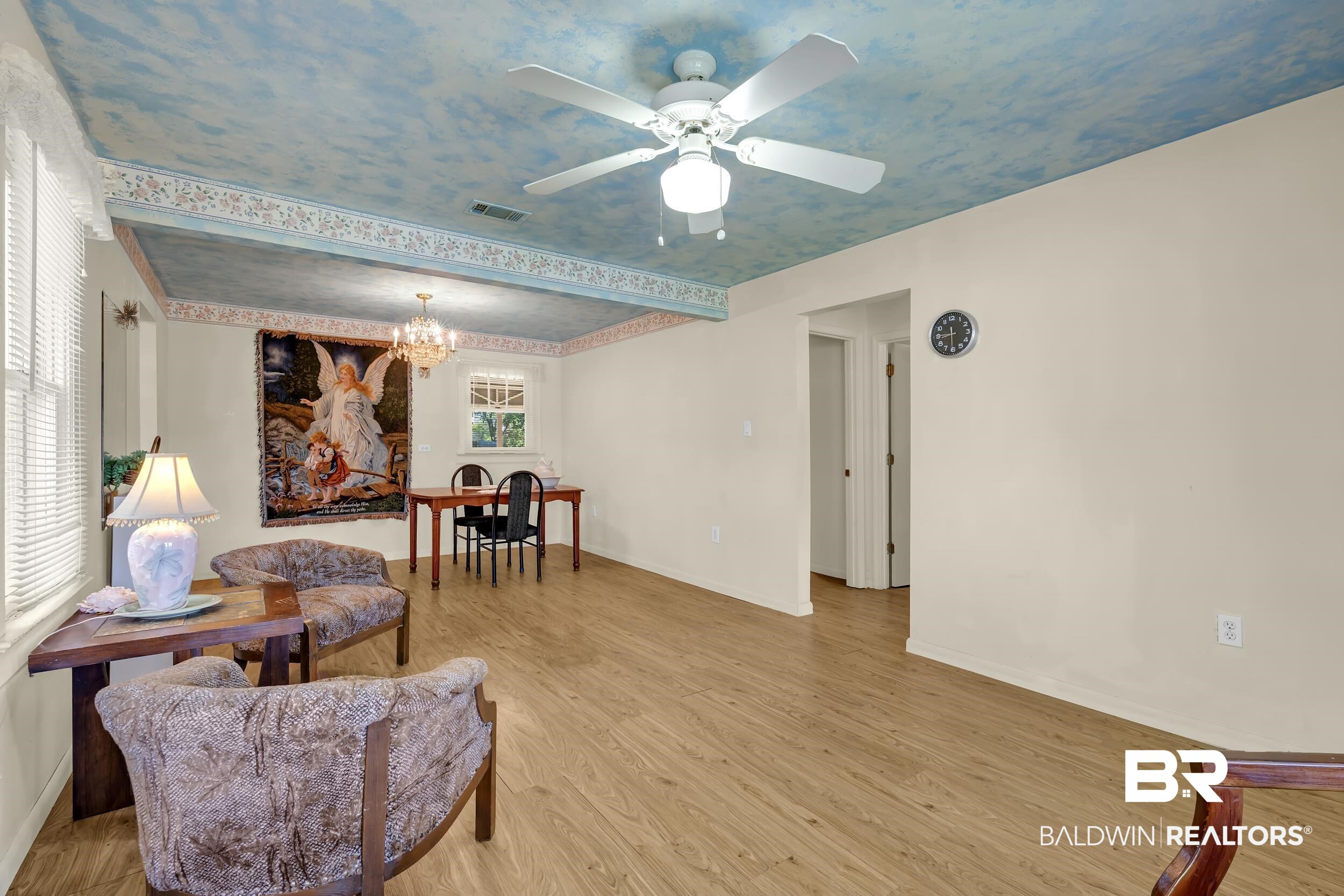 304 West Myrtle Avenue Foley, AL 36535 - Photo 4 of 29 Spacious interior room featuring wood-finish flooring, a decorative ceiling, and light-colored walls