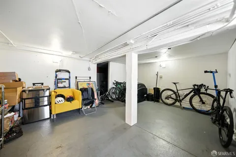 an aerial view of a houses with a yard