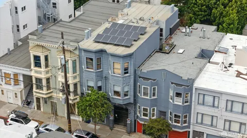 a view of a street with a building and a street light