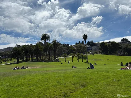a front view of a retail shop with an outdoor seating