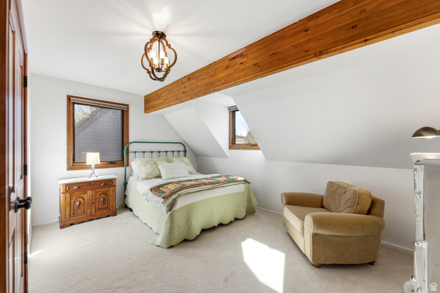 2635 Little Kate Road, Unit 21 Park City, UT 84060 - Photo 31 of 39 Bedroom featuring carpet floors, multiple windows, beamed ceiling, and suspended lighting