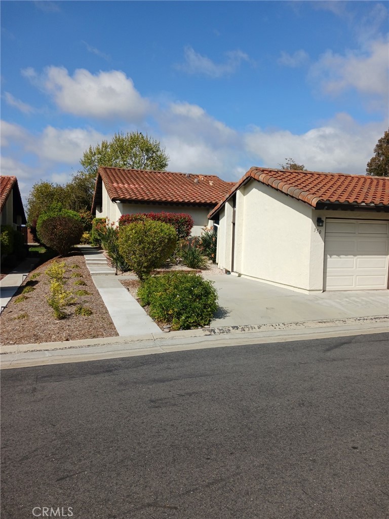 350 Abington Road Encinitas, CA 92024 - Photo 1 of 1 front view of a house with a road