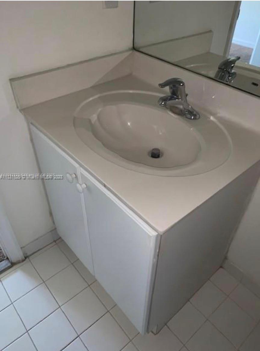 22621 Southwest 88th Place, Unit 3028 Cutler Bay, FL 33190 - Photo 15 of 18 a close view of a sink in a bathroom