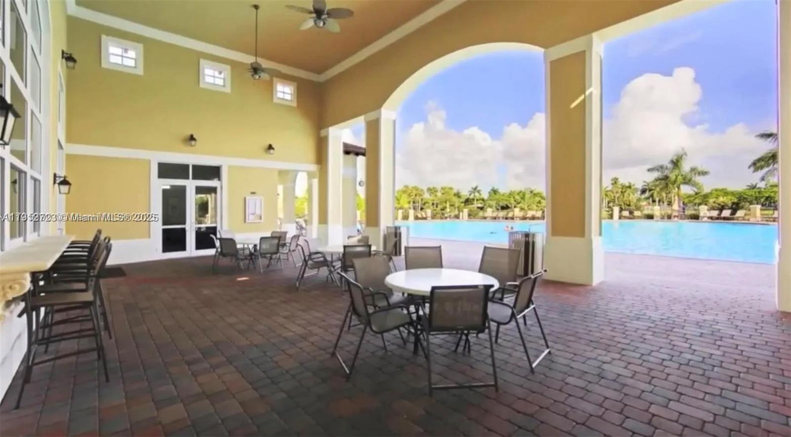 22621 Southwest 88th Place, Unit 3028 Cutler Bay, FL 33190 - Photo 17 of 18 a outdoor space with furniture