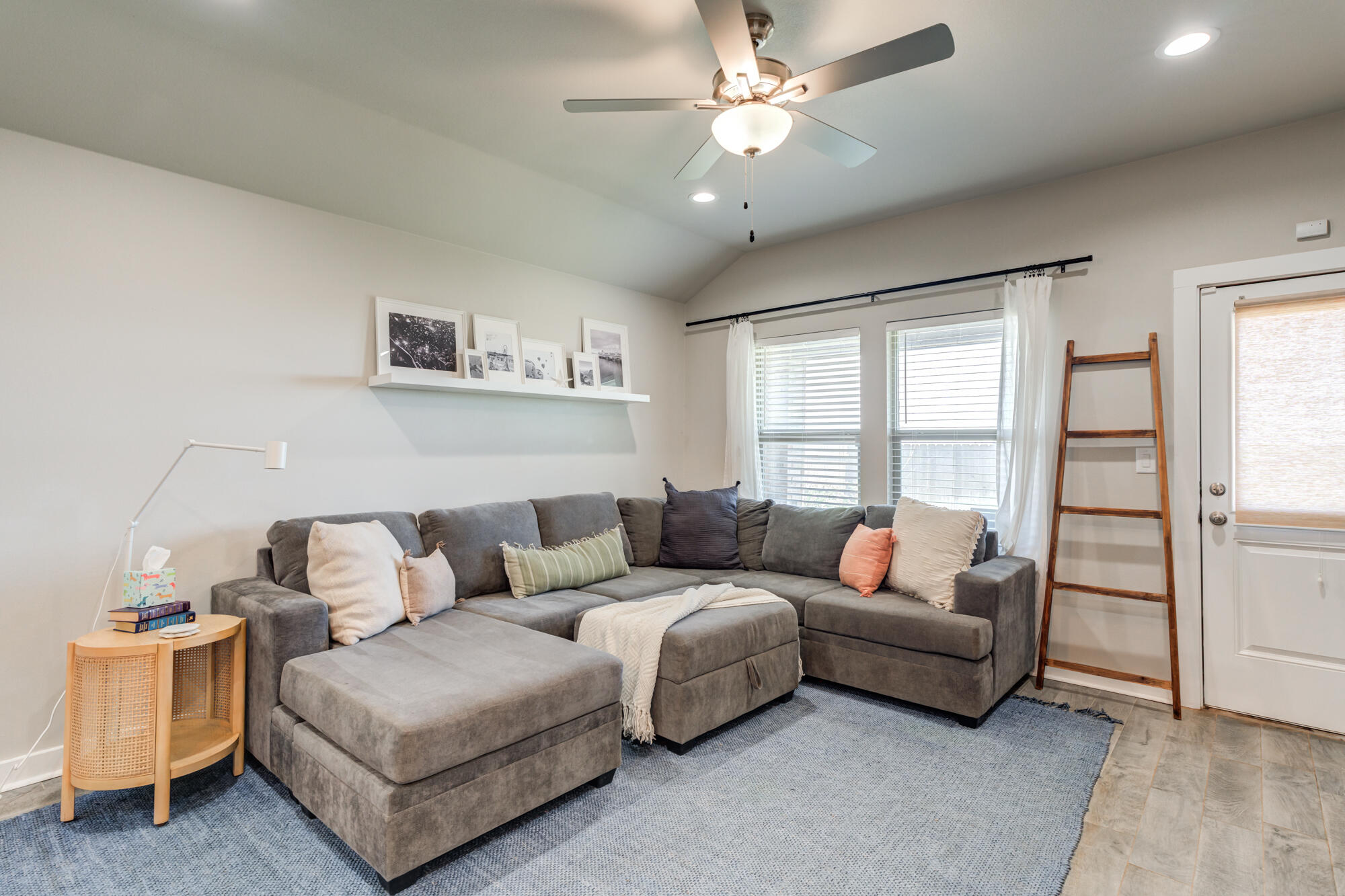 4613 126th Street Lubbock, TX 79424 - Photo 8 of 37 a living room with furniture and a large window