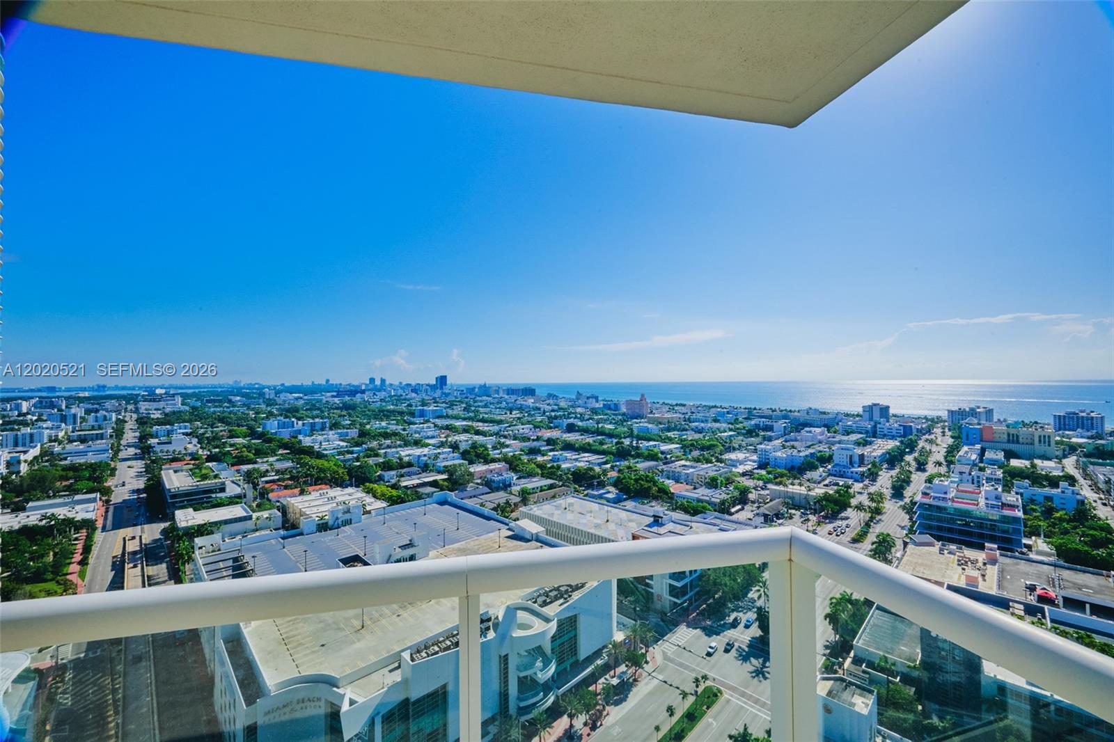 450 Alton Road, Unit 2810 Miami Beach, FL 33139 - Photo 20 of 29 a view of a city from a balcony
