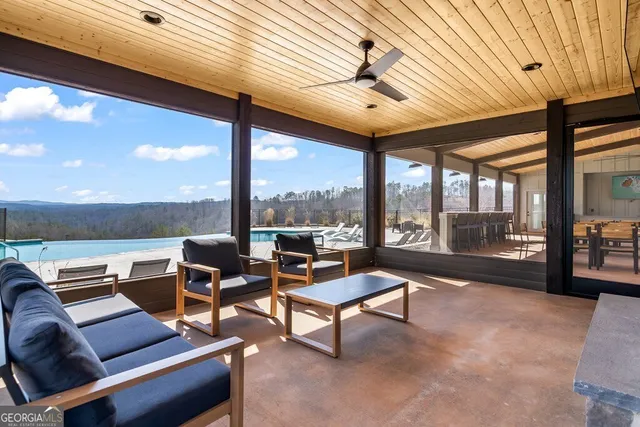 a outdoor living space with furniture and garden view