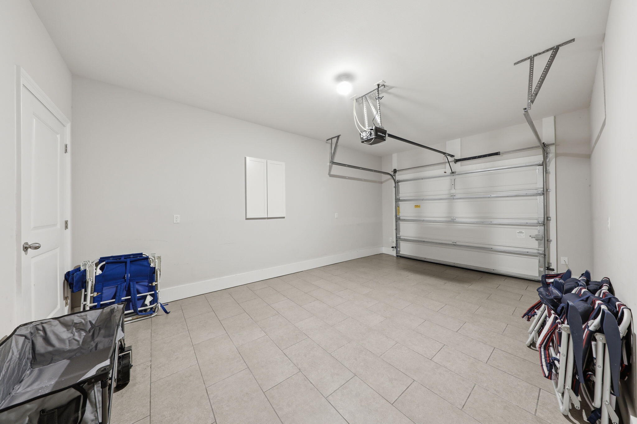 257 Driftwood Road, Unit 15 Miramar Beach, FL 32550 - Photo 19 of 69 1 car garage tile floors