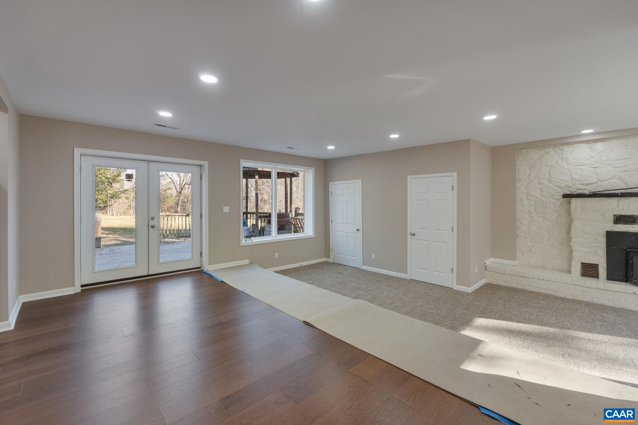 18503 Monrovia Road Orange, VA 22960 - Photo 15 of 39 a view of an empty room with a window and wooden floor