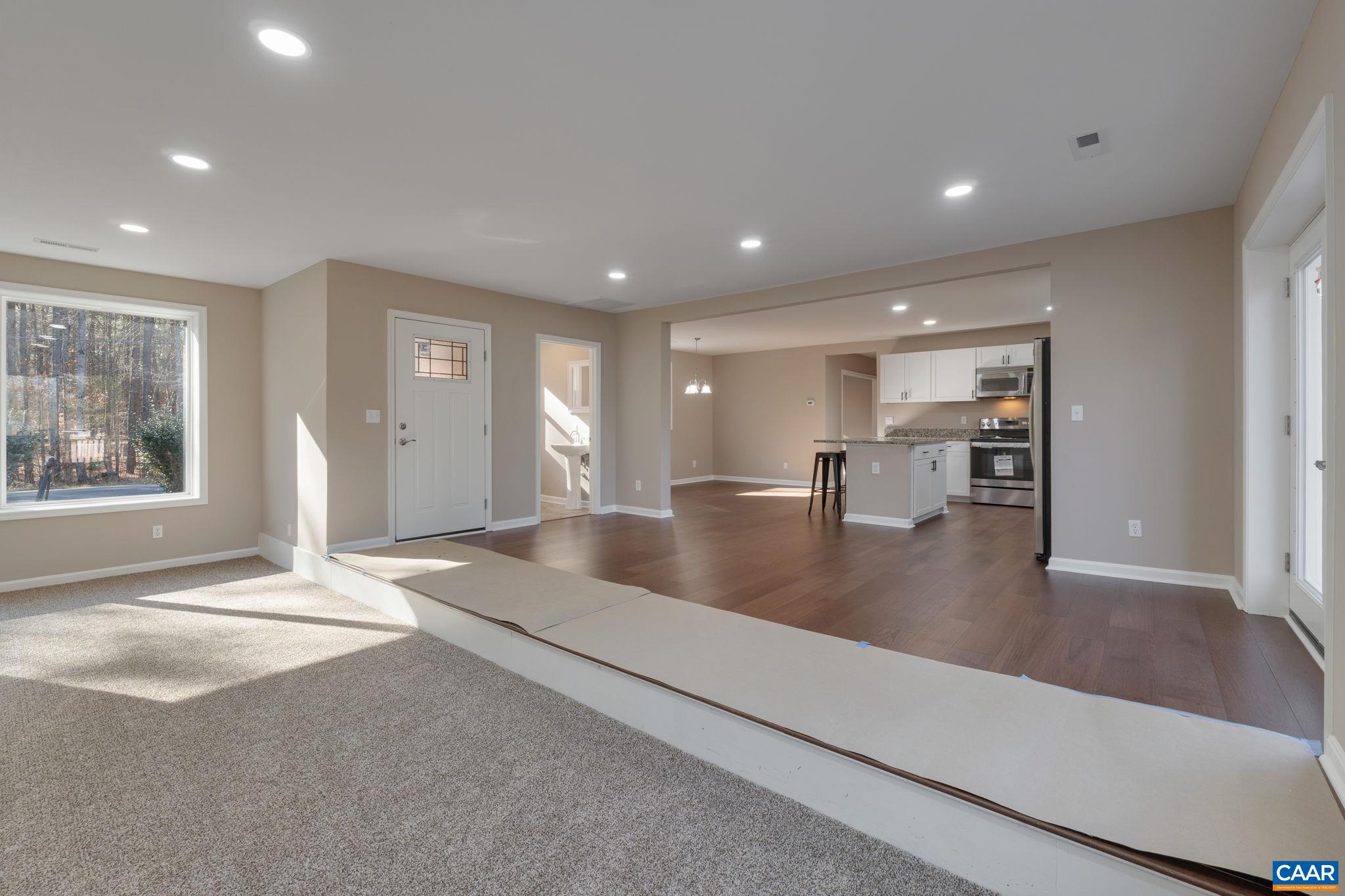 18503 Monrovia Road Orange, VA 22960 - Photo 16 of 39 a view of empty room with kitchen and sink
