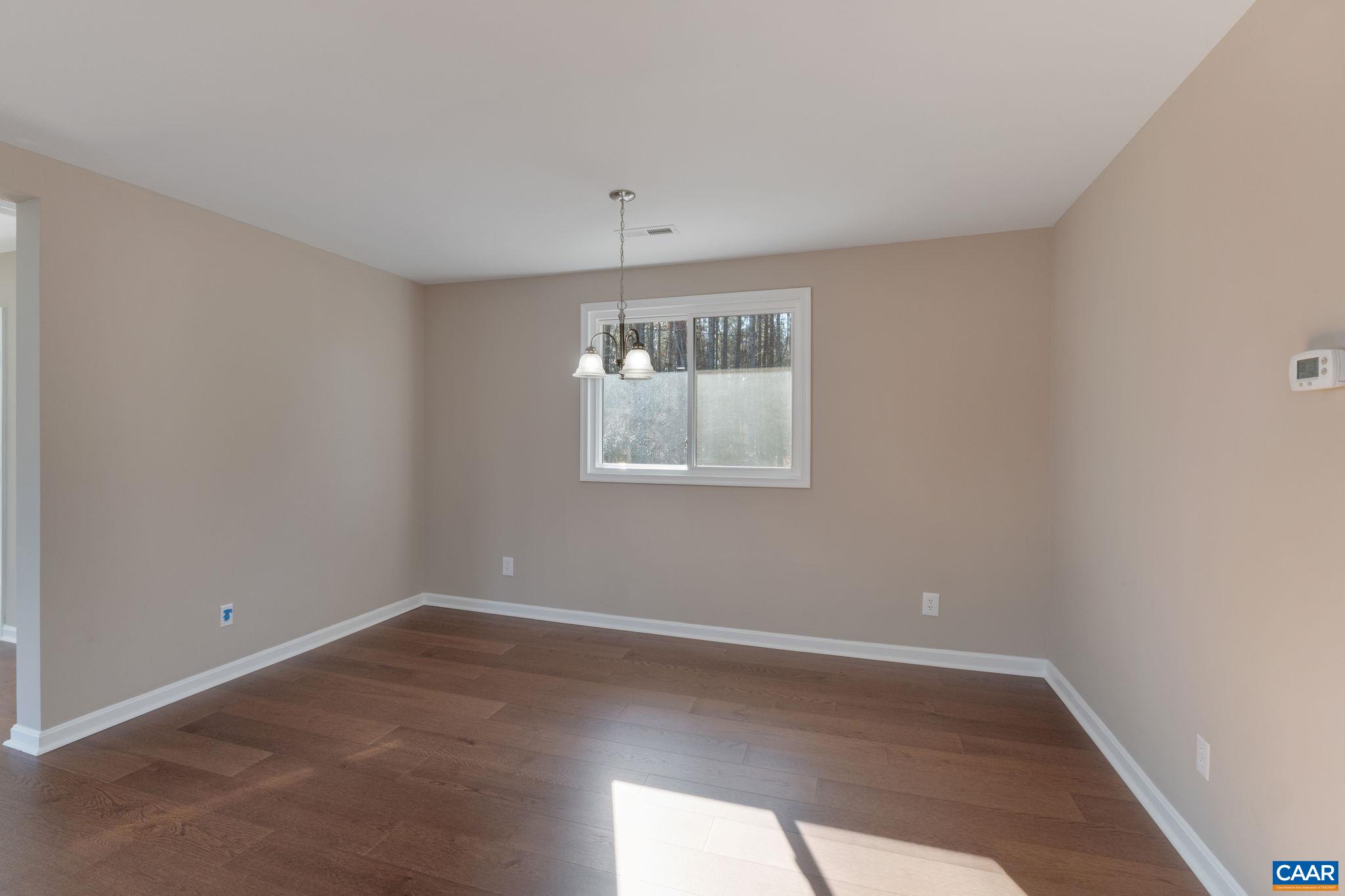 18503 Monrovia Road Orange, VA 22960 - Photo 27 of 39 wooden floor in an empty room with a window