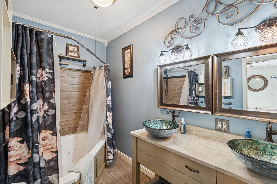 6303 Sullivan Road Lyles, TN 37098 - Photo 15 of 43 a bathroom with a granite countertop sink and a mirror