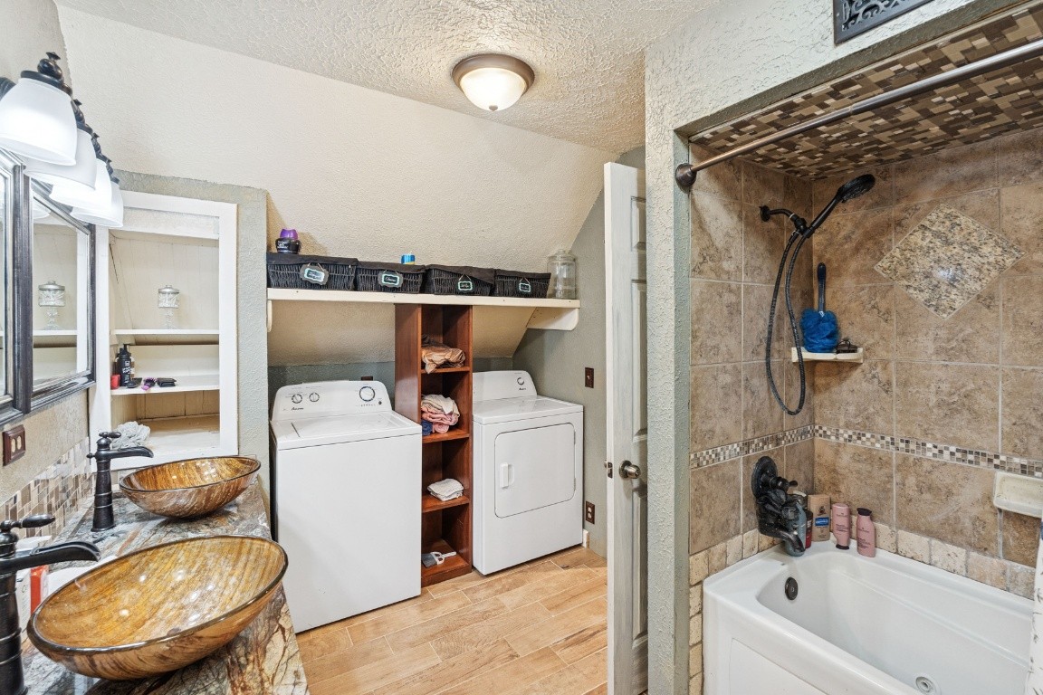 6303 Sullivan Road Lyles, TN 37098 - Photo 28 of 43 a bathroom with a tub toilet and sink