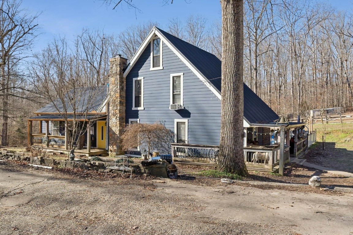 6303 Sullivan Road Lyles, TN 37098 - Photo 43 of 43 a view of a house with a yard