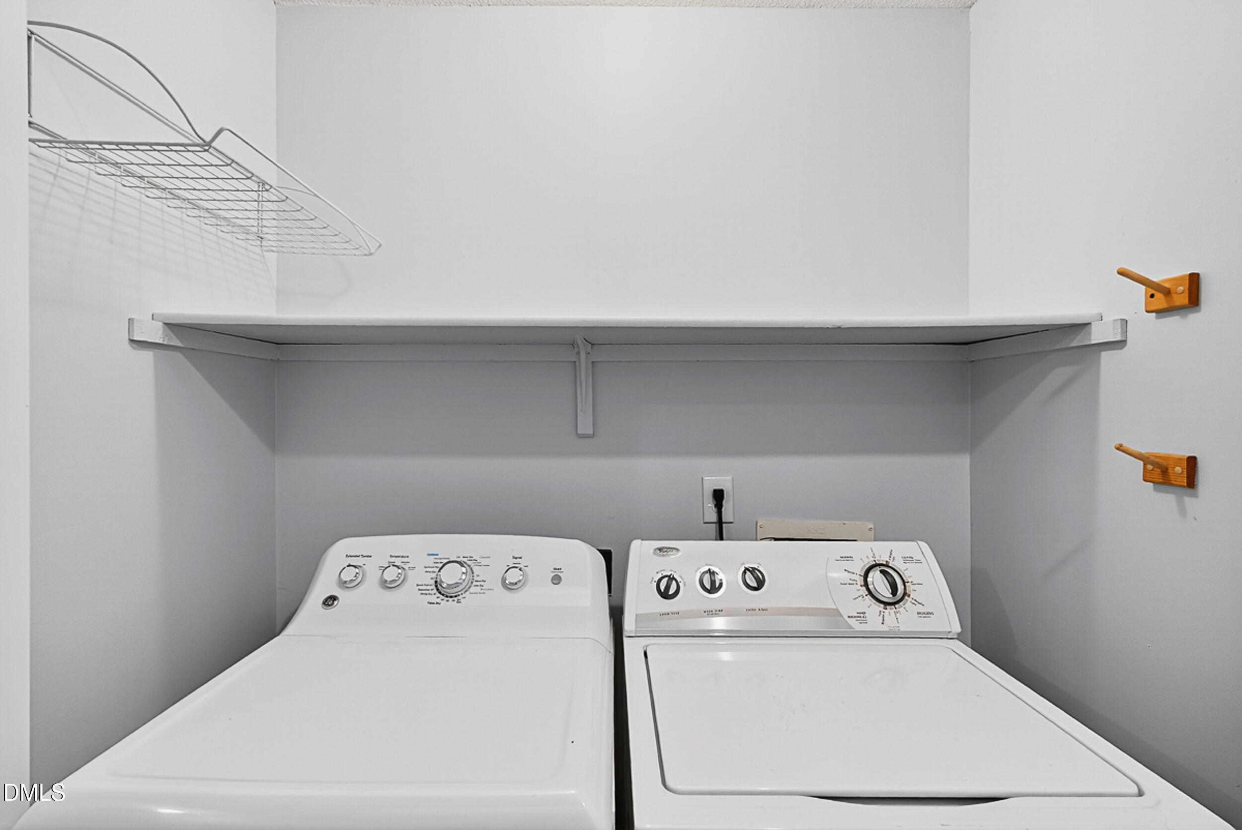 4617 Fawnbrook Circle Raleigh, NC 27612 - Photo 18 of 22 a utility room with dryer and washer