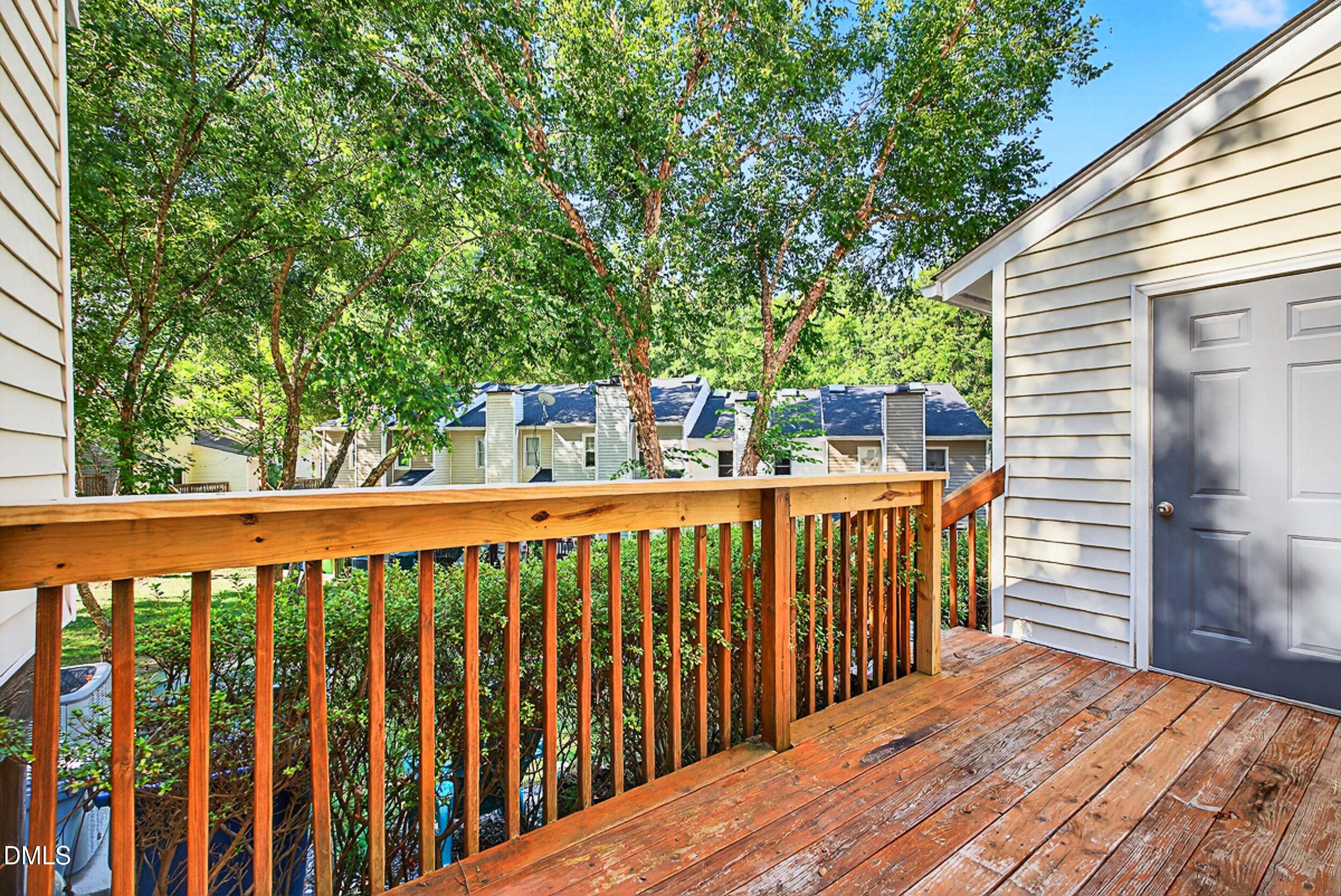4617 Fawnbrook Circle Raleigh, NC 27612 - Photo 19 of 22 a view of balcony with wooden floor and fence