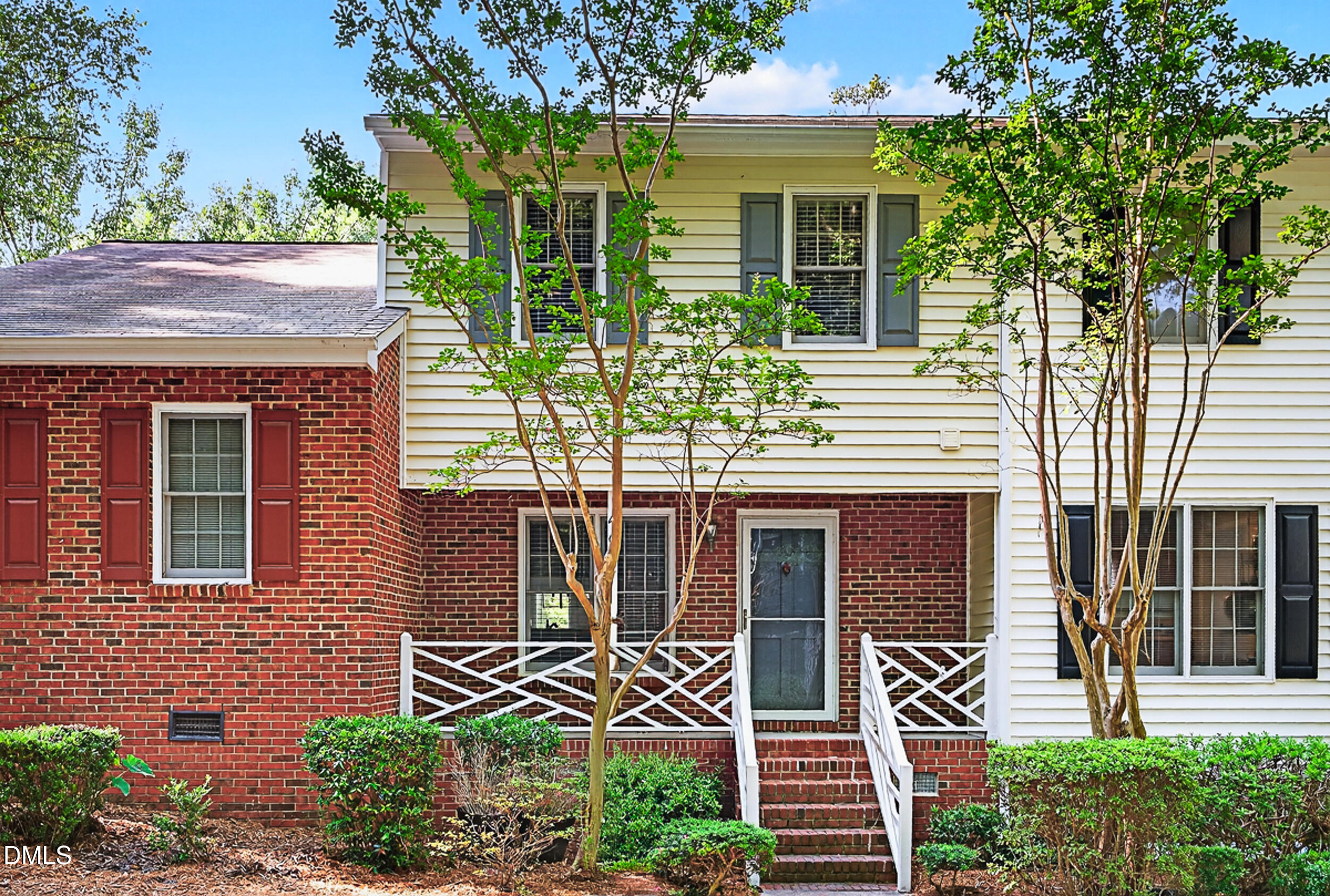 4617 Fawnbrook Circle Raleigh, NC 27612 - Photo 2 of 22 a front view of a house with a yard