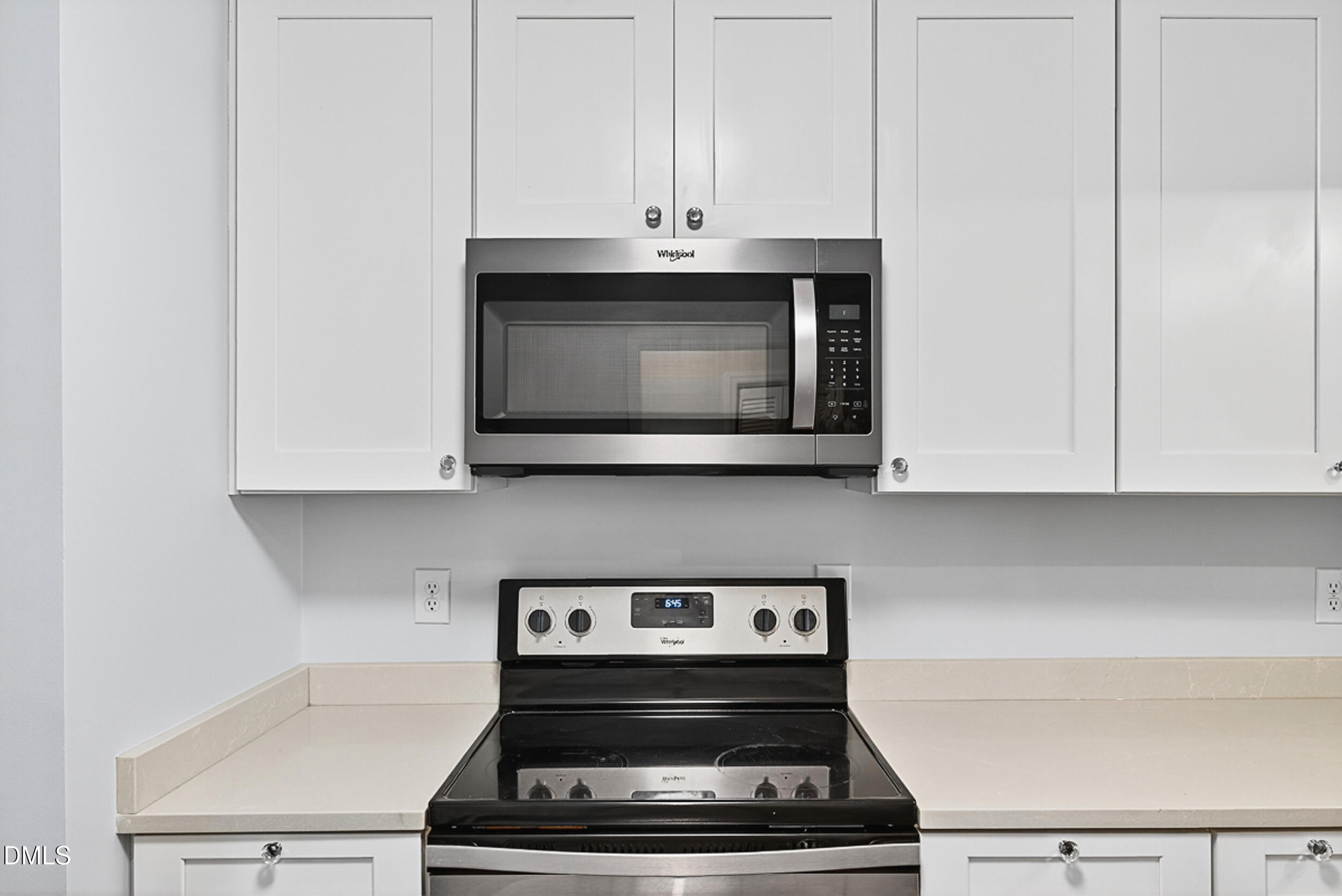 4617 Fawnbrook Circle Raleigh, NC 27612 - Photo 8 of 22 a stove top oven sitting inside of a kitchen