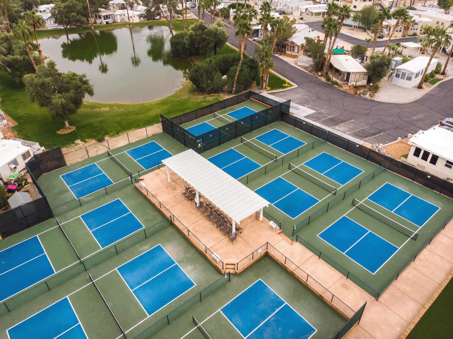 74711 Dillon Road, Unit 392 Desert Hot Springs, CA 92241 - Photo 39 of 46 a aerial view of a pool patio outdoor seating and water view