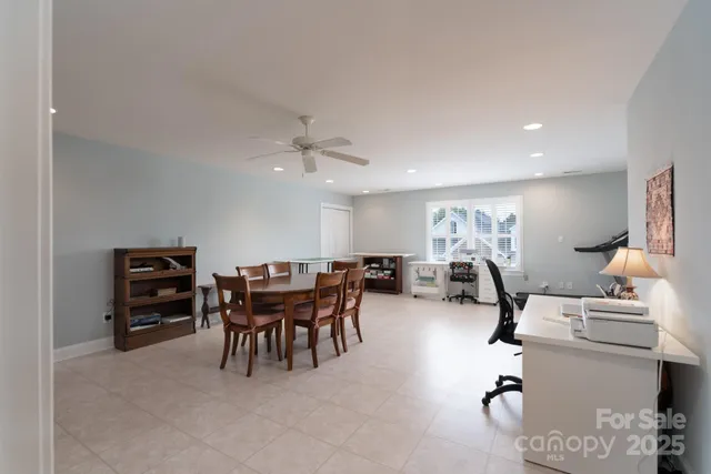 a view of a workspace with furniture