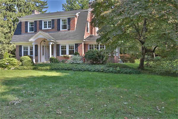 27 Bancroft Road Andover, MA 01810 - Photo 2 of 27 a front view of a house with garden and trees
