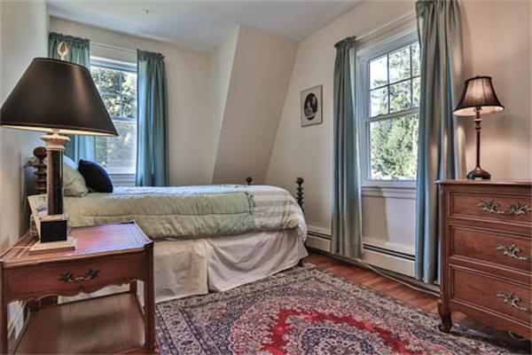 27 Bancroft Road Andover, MA 01810 - Photo 22 of 27 a bedroom with a bed and a window