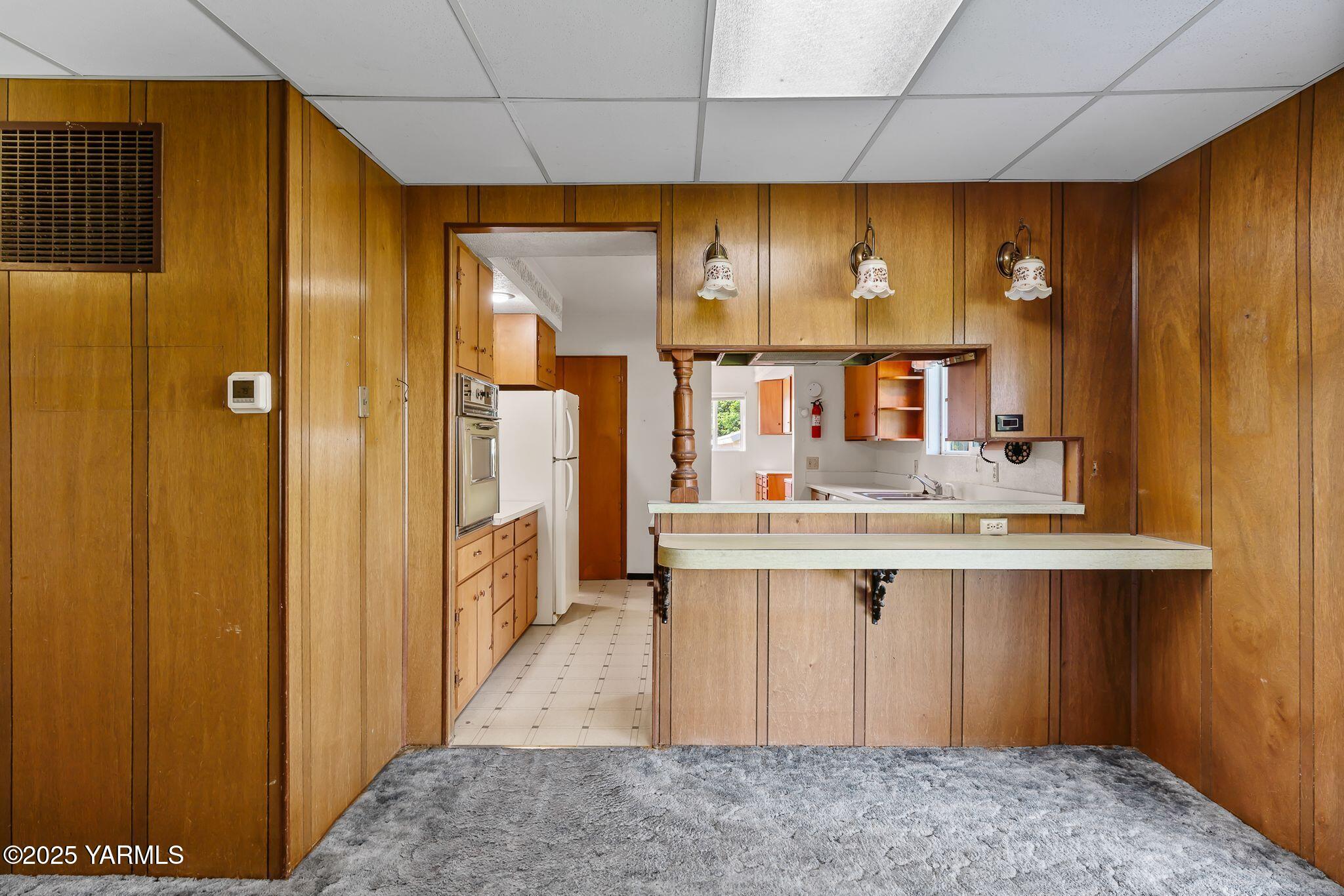 2006 Ekelman Road Yakima, WA 98901 - Photo 8 of 27 a kitchen with stainless steel appliances granite countertop a sink and cabinets
