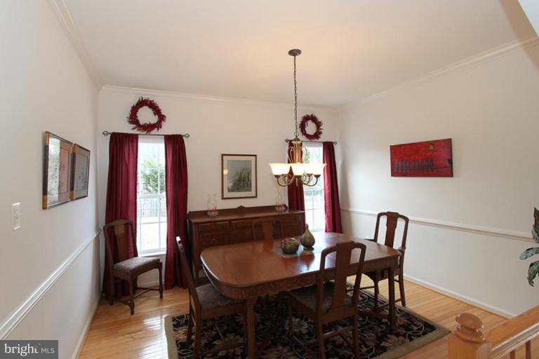 14208 Autumn Gold Road Boyds, MD 20841 - Photo 8 of 21 a view of a dining room with furniture and window
