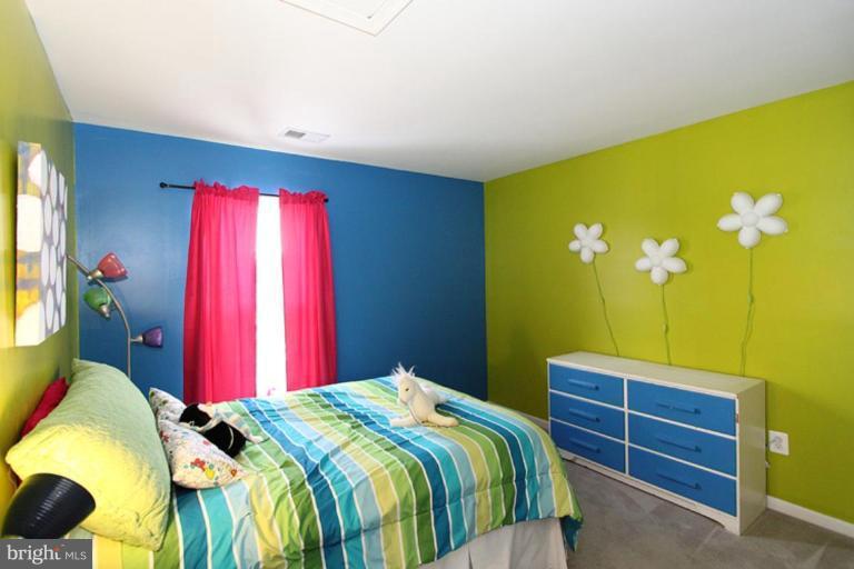14208 Autumn Gold Road Boyds, MD 20841 - Photo 10 of 21 a bedroom with a bed and a closet