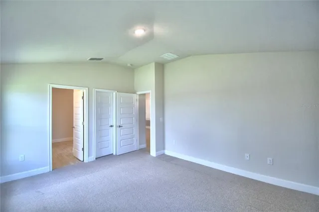 a view of a room with racks on the wall