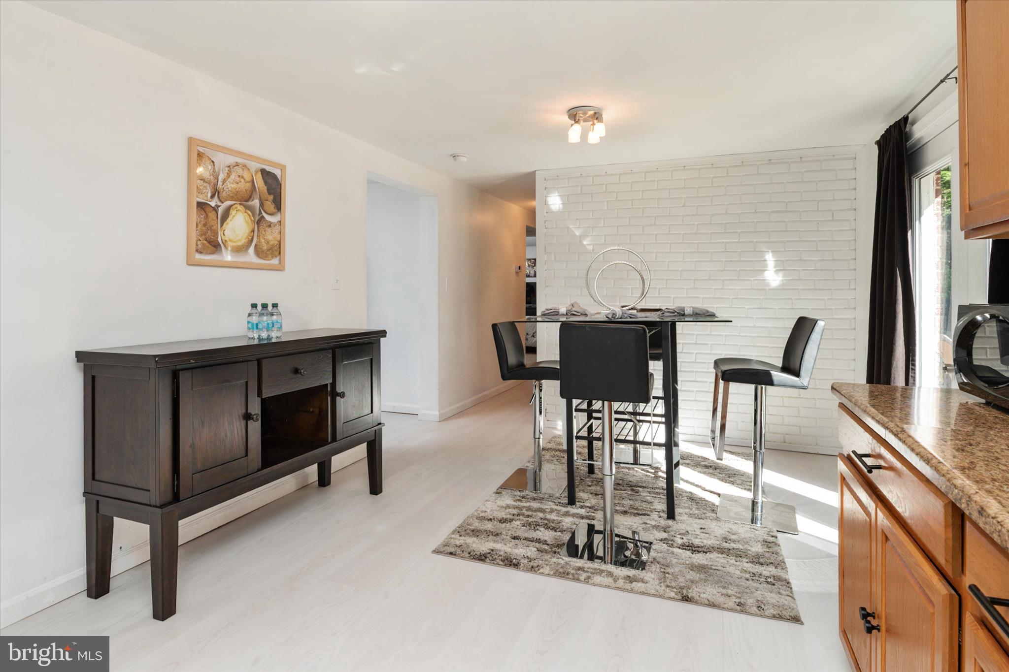 108 Wilson Road Grasonville, MD 21658 - Photo 11 of 38 a view of a dining room with furniture