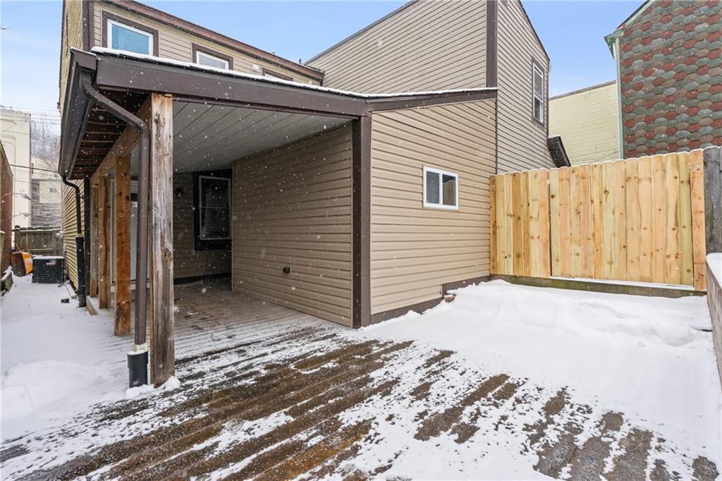 1015 Constance Street Pittsburgh, PA 15212 - Photo 24 of 25 a view of a house with a snow on the road