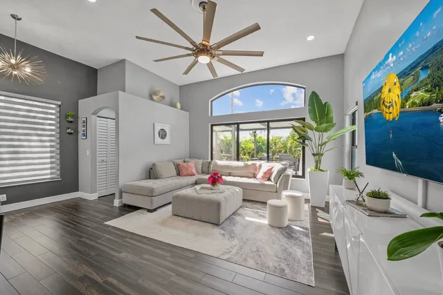 a workspace with furniture window and wooden floor