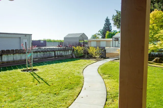 a view of a swimming pool with a patio