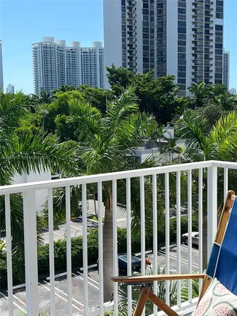 a view of a balcony with a garden