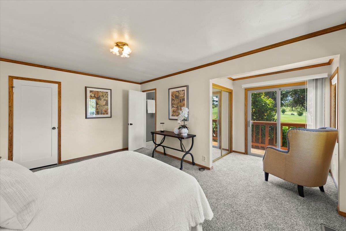 472 Helen Drive Millbrae, CA 94030 - Photo 23 of 35 a bedroom with a bed and large windows