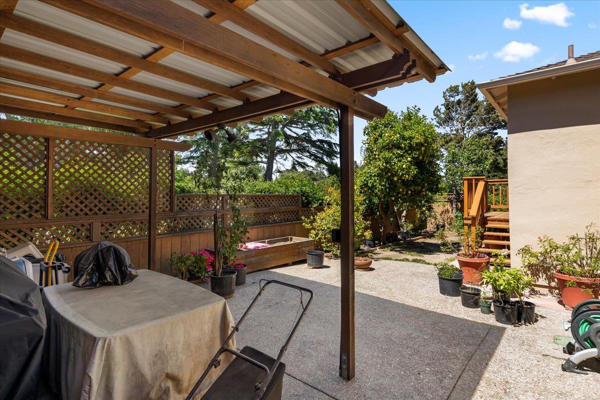 472 Helen Drive Millbrae, CA 94030 - Photo 28 of 35 a view of a patio with table and chairs and potted plants