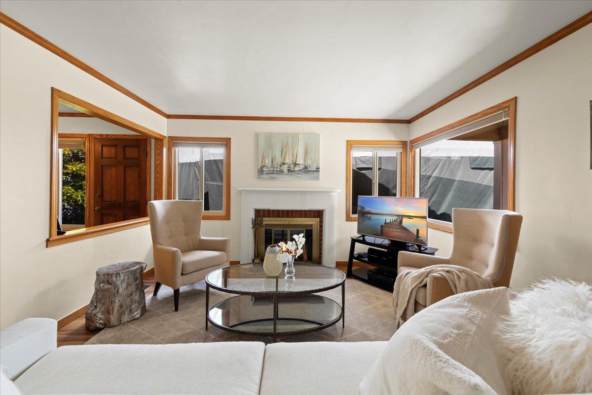 472 Helen Drive Millbrae, CA 94030 - Photo 5 of 35 a living room with furniture and a fireplace