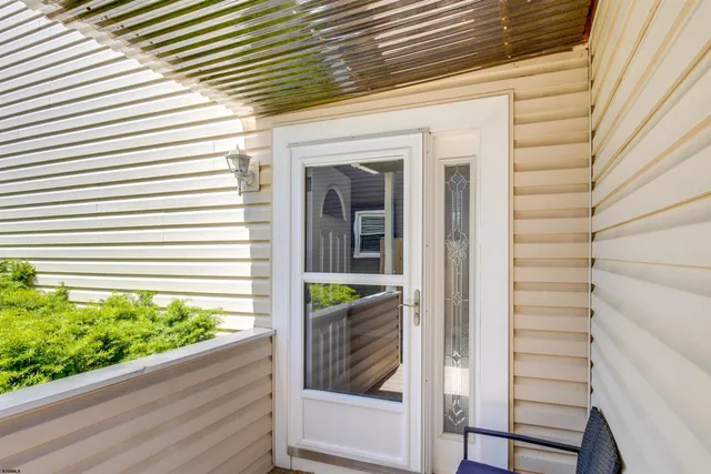 a front view of a house with a porch
