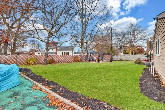 a view of a park with large trees