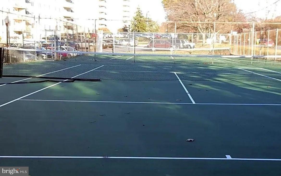 1111 University Boulevard West, Unit 501A Silver Spring, MD 20902 - Photo 11 of 13 a view of a tennis court