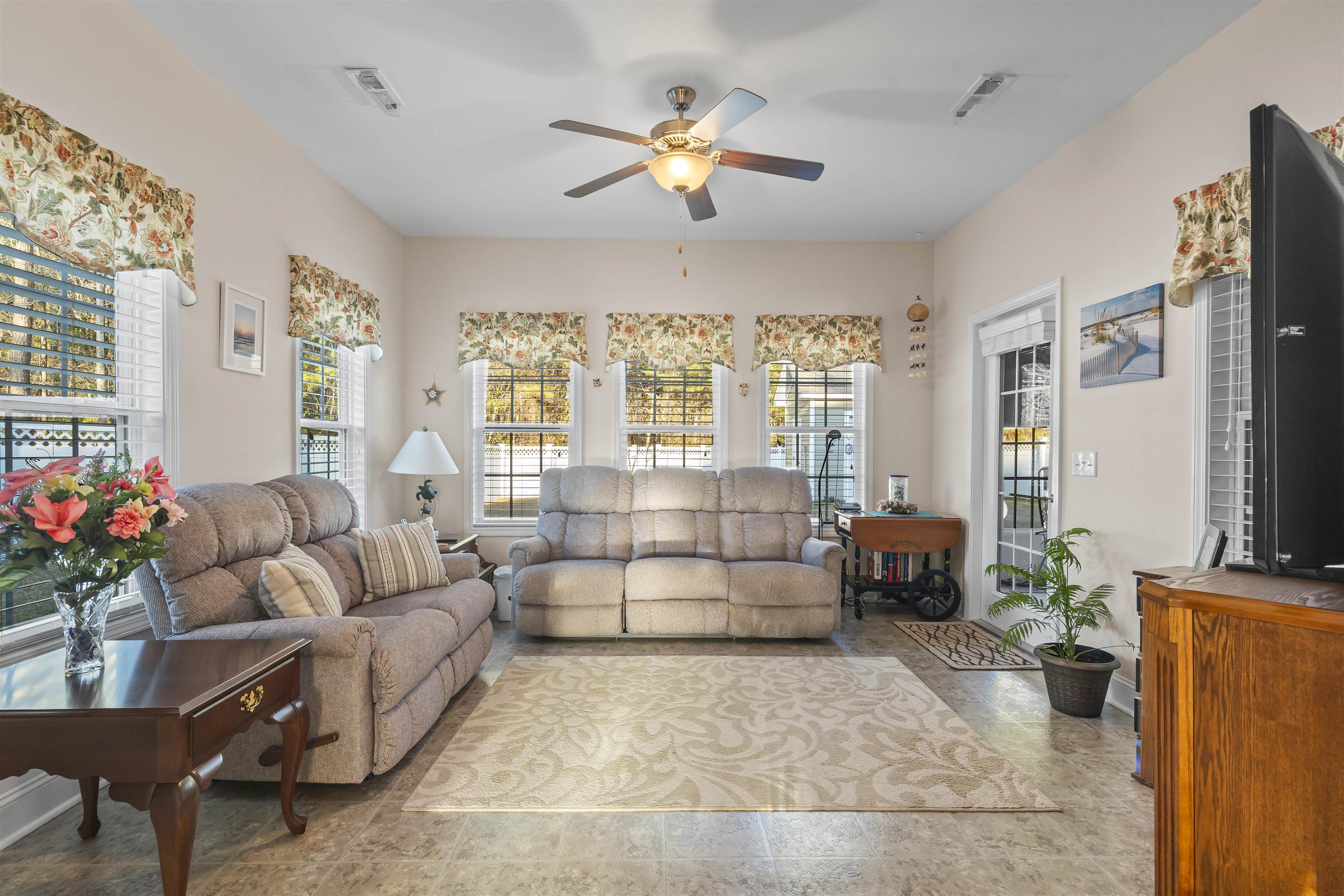 830 Payne Court Conway, SC 29526 - Photo 17 of 38 Living room featuring ceiling fan and plenty of natural light