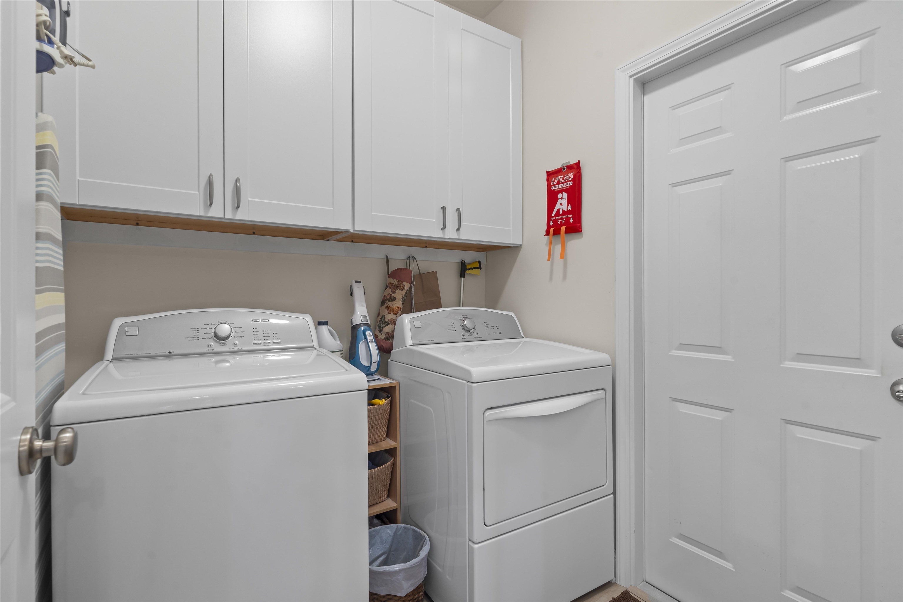 830 Payne Court Conway, SC 29526 - Photo 18 of 38 Washroom with independent washer and dryer and cabinet space