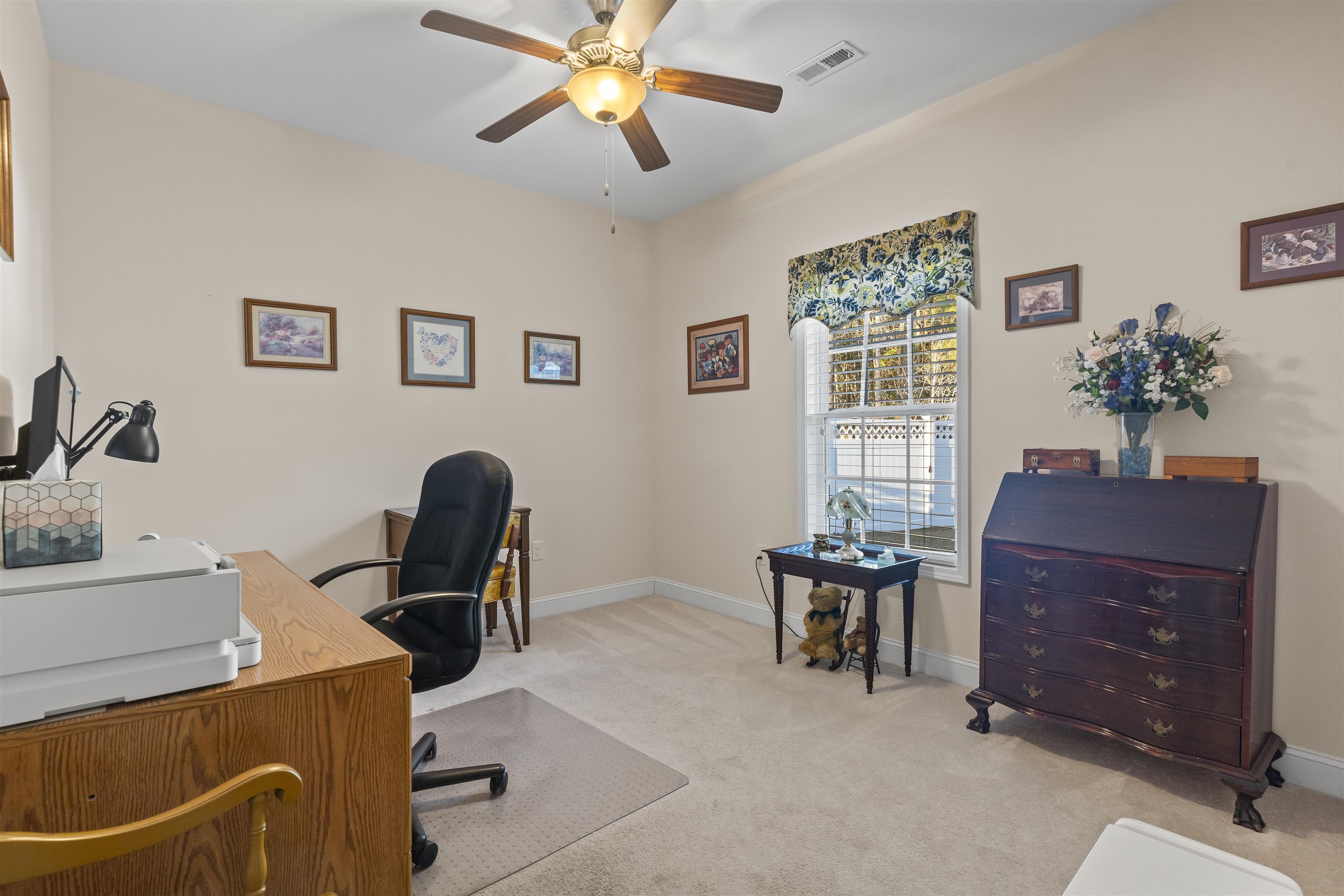 830 Payne Court Conway, SC 29526 - Photo 23 of 38 Office area with light colored carpet and a ceiling fan