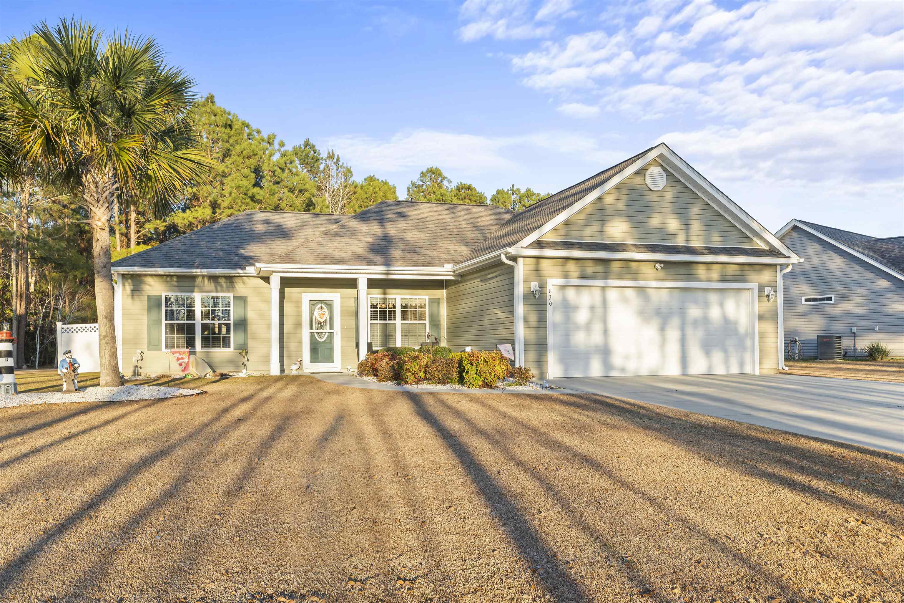 830 Payne Court Conway, SC 29526 - Photo 36 of 38 View of front facade featuring driveway and an attached garage