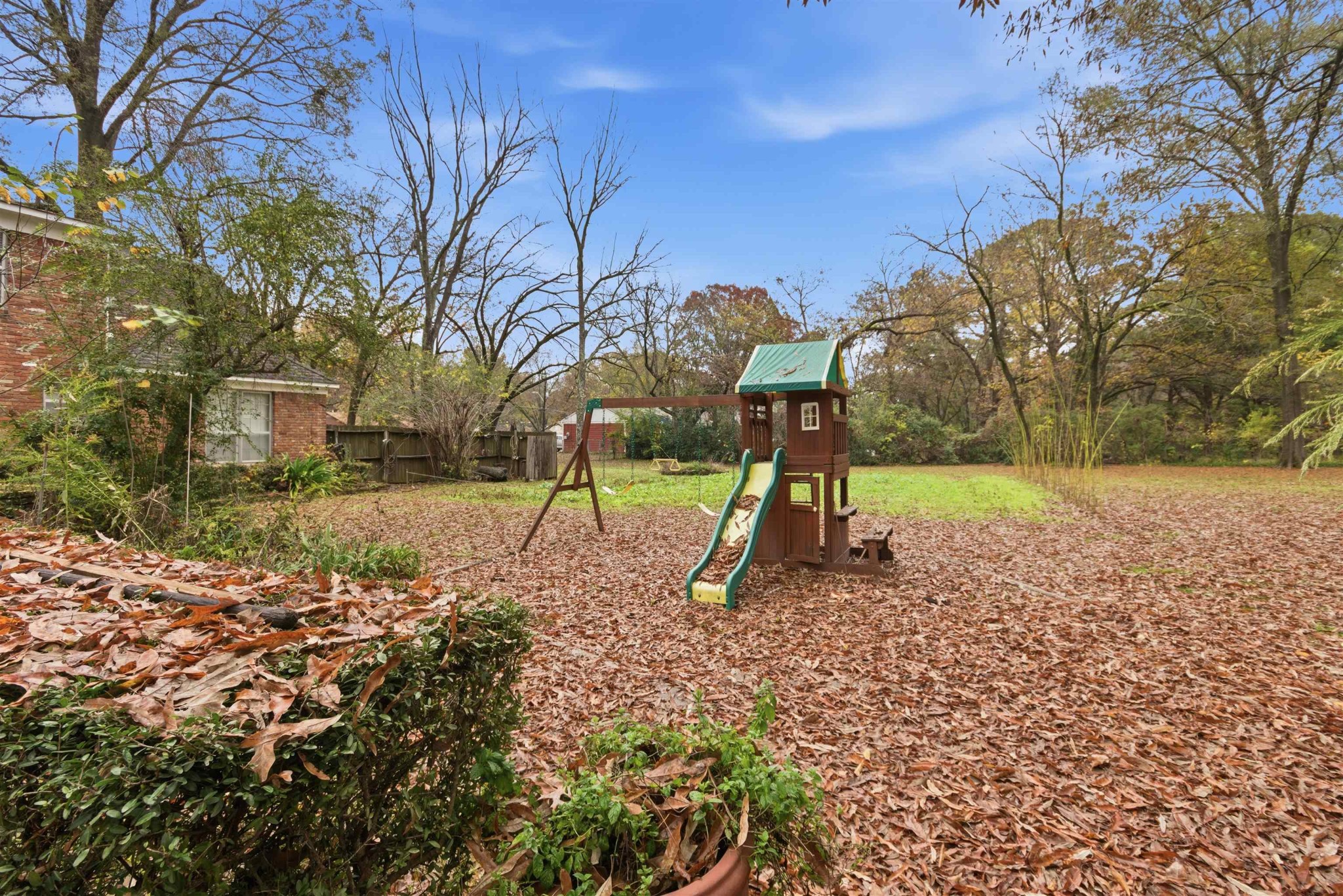 1015 Palmer Road Memphis, TN 38116 - Photo 23 of 26 a view of a park with swings
