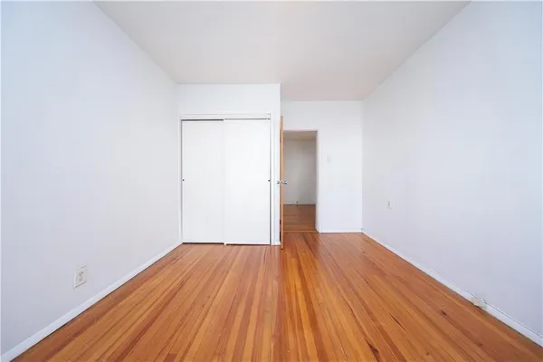 a view of a big room with wooden floor