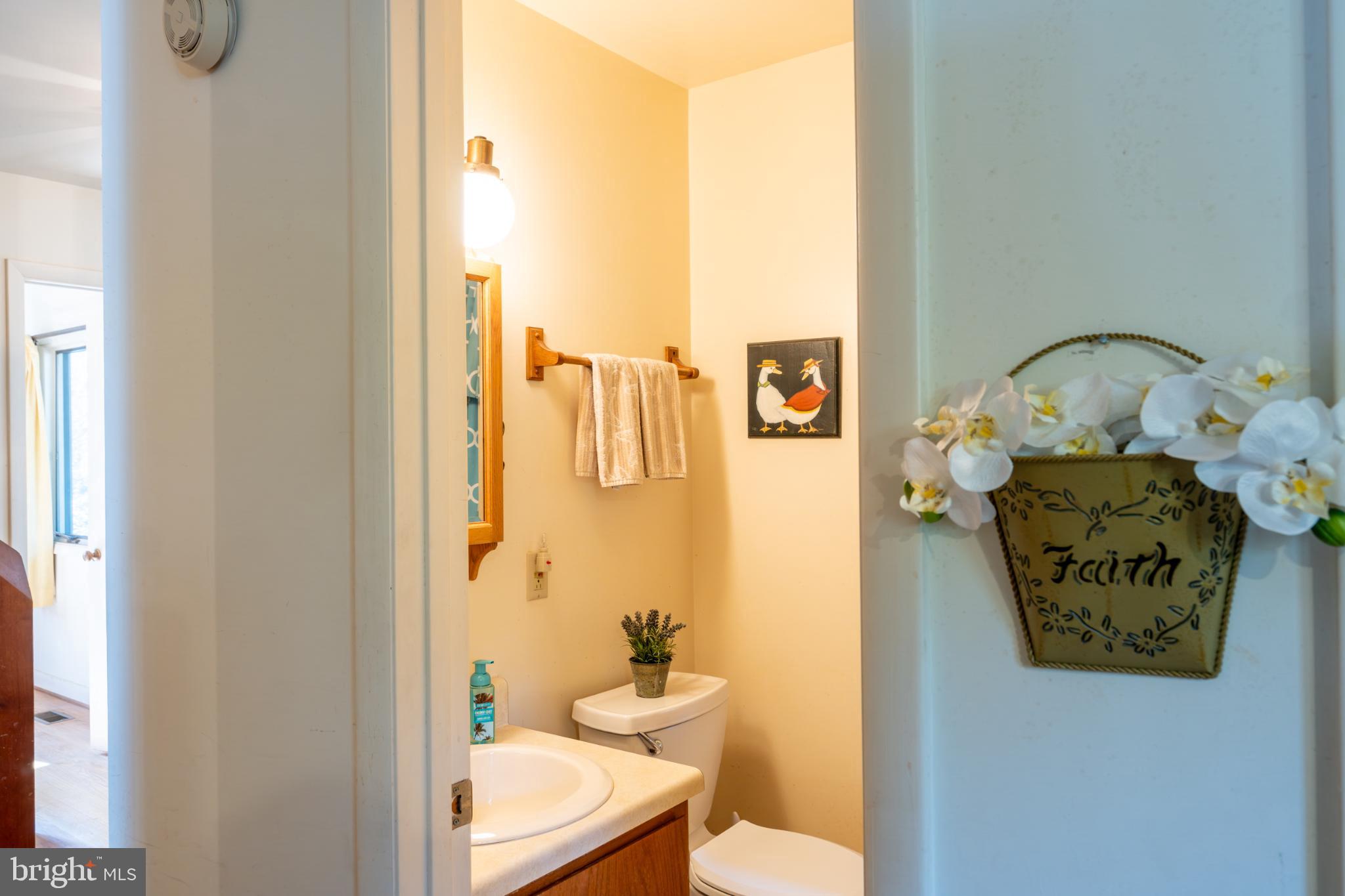 162 Youcomico Drive Lancaster, VA 22503 - Photo 15 of 31 a bathroom with a sink toilet and shower